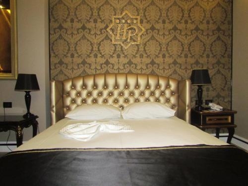 Imagen de la habitación del Hotel Hymetis Palace. Foto 9