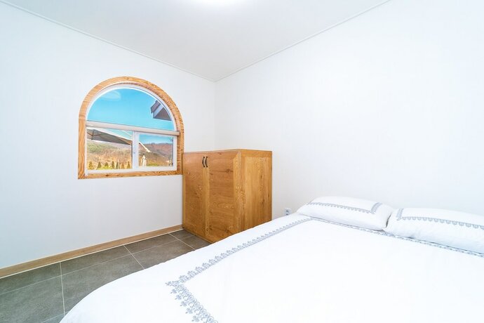 Imagen de la habitación del Hotel Hyovely House. Foto 22