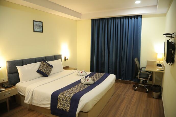 Imagen de la habitación del Hotel Hyphen Grand Hotel. Foto 18