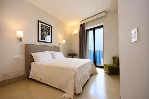 Imagen de la habitación del Hotel I Bastioni San Domenico. Foto 7