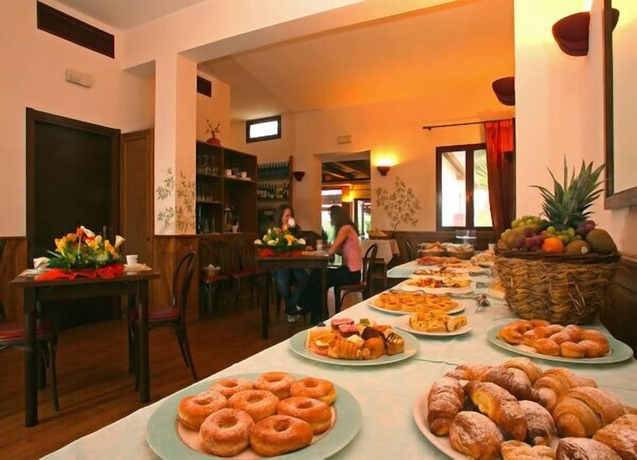 Imagen del bar/restaurante del Hotel I Briganti Di Capalbio. Foto 2