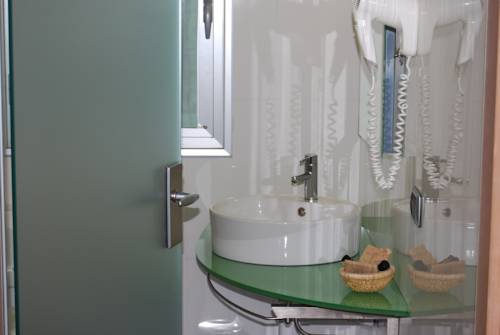 Imagen de la habitación del Hotel I Cedri. Foto 9