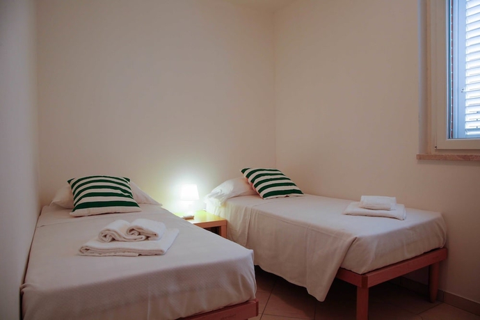 Imagen de la habitación del Hotel I Cinque Pini. Foto 13