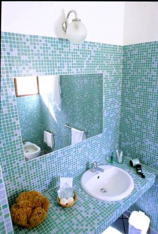 Imagen de la habitación del Hotel I Dammusi Di Borgo Cala Creta. Foto 5