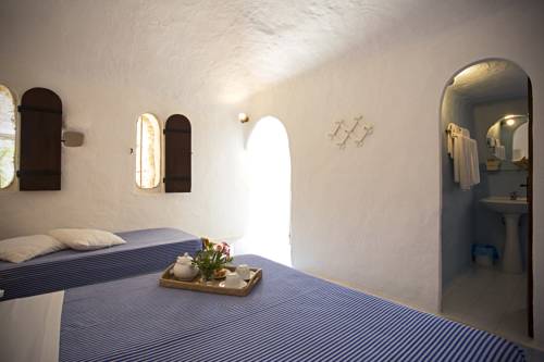 Imagen de la habitación del Hotel I Dammusi Di Borgo Cala Creta. Foto 7