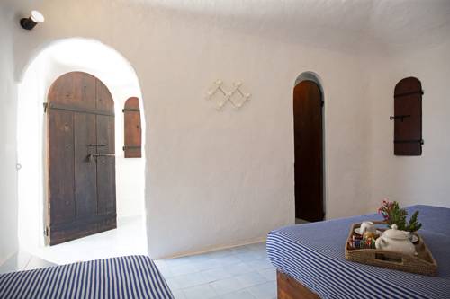 Imagen de la habitación del Hotel I Dammusi Di Borgo Cala Creta. Foto 9
