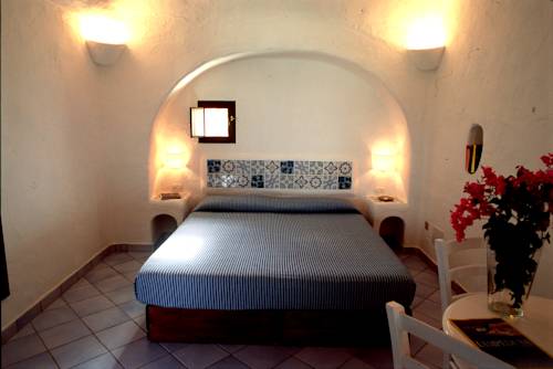 Imagen de la habitación del Hotel I Dammusi Di Borgo Cala Creta. Foto 16