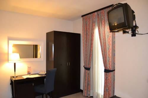 Imagen de la habitación del Hotel I' Fiorino. Foto 5