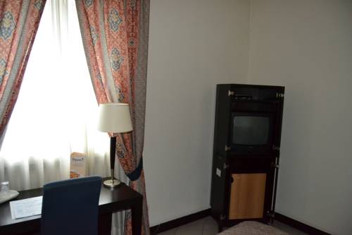 Imagen de la habitación del Hotel I' Fiorino. Foto 7