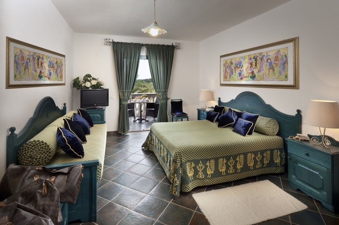 Imagen de la habitación del Hotel I Giardini Di Cala Ginepro Resort. Foto 8