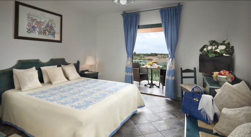 Imagen de la habitación del Hotel I Giardini Di Cala Ginepro Resort. Foto 9