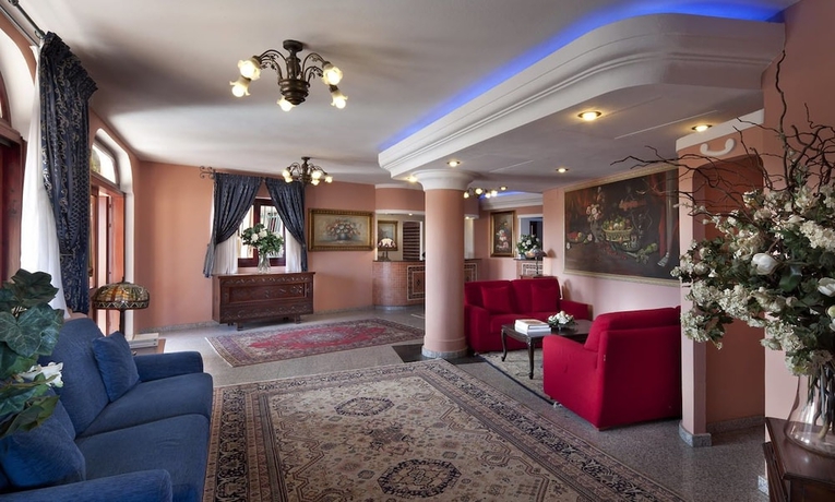 Imagen de los interiores del Hotel I Giardini Di Cala Ginepro Resort. Foto 17