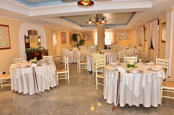 Imagen del bar/restaurante del Hotel I Giardini Di Cala Ginepro Resort. Foto 5