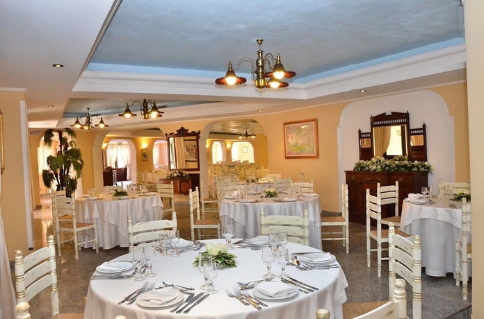 Imagen del bar/restaurante del Hotel I Giardini Di Cala Ginepro Resort. Foto 6
