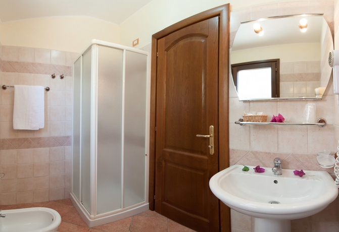 Imagen de la habitación del Hotel I Ginepri, Cala Gonone. Foto 14