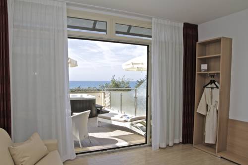 Imagen de la habitación del Hotel I Ginepri, Marina Di Castagneto Carducci. Foto 3