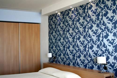 Imagen de la habitación del Hotel I Ginepri, Marina Di Castagneto Carducci. Foto 7