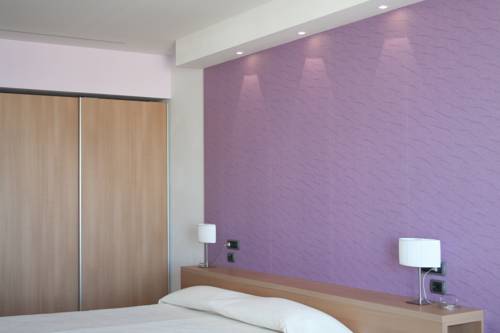 Imagen de la habitación del Hotel I Ginepri, Marina Di Castagneto Carducci. Foto 8