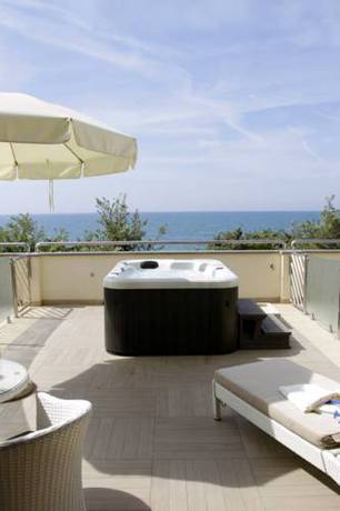 Imagen de la habitación del Hotel I Ginepri, Marina Di Castagneto Carducci. Foto 16