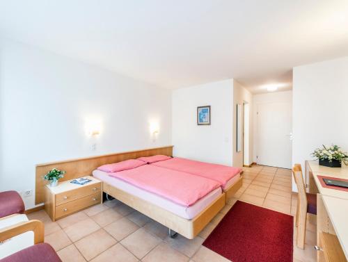 Imagen de la habitación del Hotel I Grappoli. Foto 7