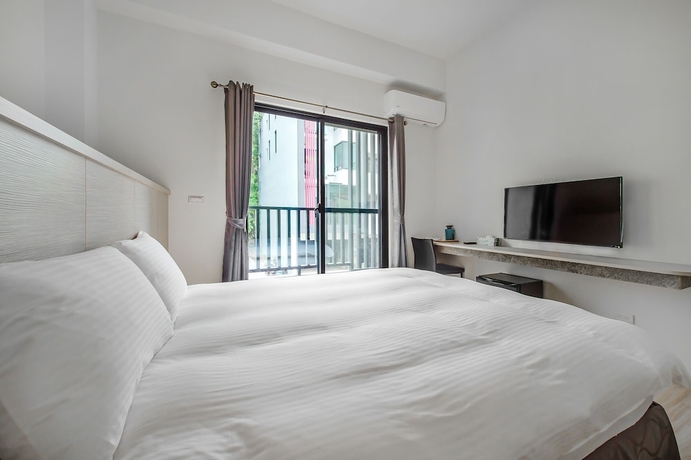 Imagen de la habitación del Hotel I Love You Homestay. Foto 9