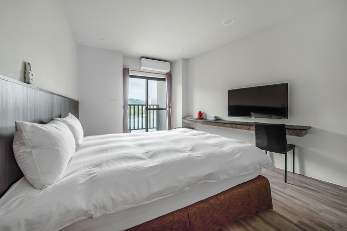 Imagen de la habitación del Hotel I Love You Homestay. Foto 11