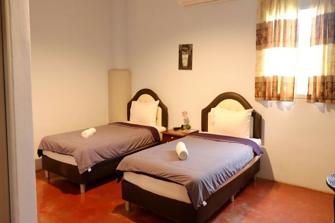 Imagen de la habitación del Hotel I Na Seaview. Foto 22