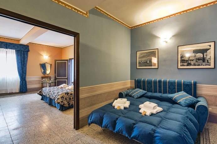 Imagen de la habitación del Hotel I Portici Residenza D’epoca. Foto 4