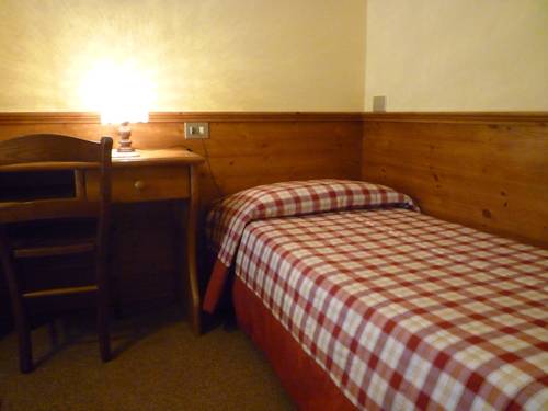 Imagen de la habitación del Hotel I Rododendri. Foto 1