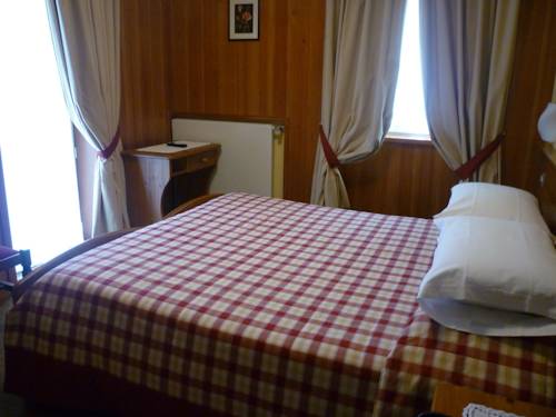 Imagen de la habitación del Hotel I Rododendri. Foto 2