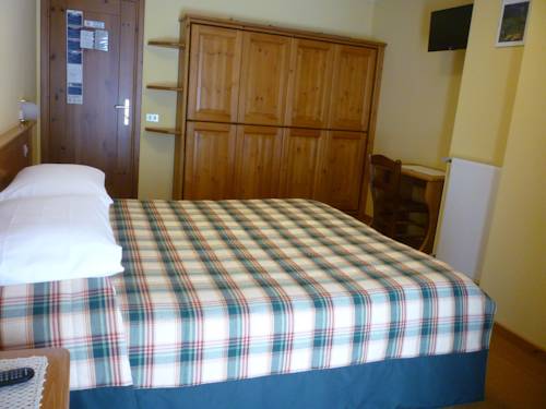 Imagen de la habitación del Hotel I Rododendri. Foto 4