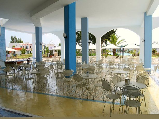 Imagen del bar/restaurante del Hotel I Turchesi Club Village. Foto 2