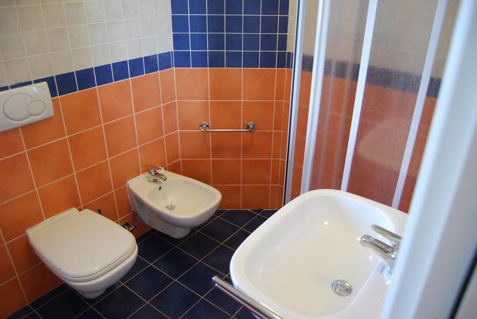 Imagen de la habitación del Hotel I Turchesi Club Village. Foto 7