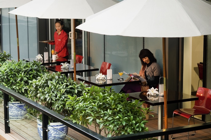 Imagen de los exteriores del Hotel IBIS BEIJING SANYUAN. Foto 12