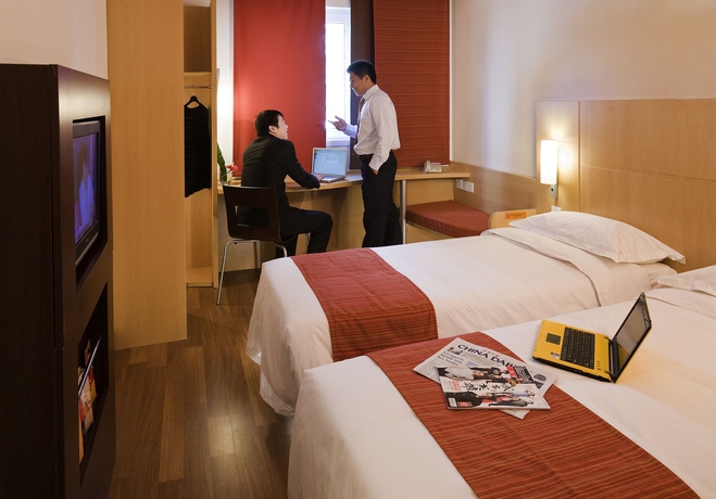 Imagen de la habitación del Hotel IBIS BEIJING SANYUAN. Foto 10