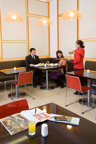 Imagen del bar/restaurante del Hotel IBIS BEIJING SANYUAN. Foto 6