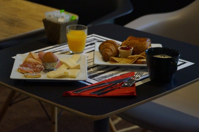 Imagen del bar/restaurante del Hotel IBIS VESOUL. Foto 6