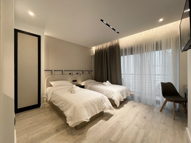 Imagen de la habitación del Hotel ICON Urban Living. Foto 17