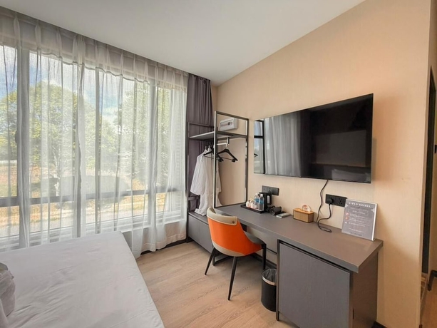 Imagen de la habitación del Hotel I-FLY HOTEL. Foto 11
