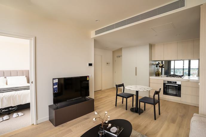 Imagen de la habitación del Hotel IFSuites Melbourne Village. Foto 11