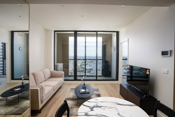 Imagen de la habitación del Hotel IFSuites Melbourne Village. Foto 19