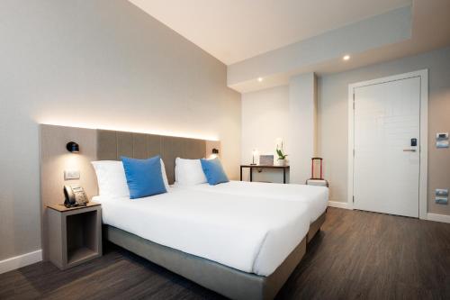 Imagen de la habitación del Hotel IH Hotels Milano Centrale. Foto 10