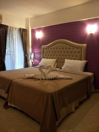 Imagen de la habitación del Hotel I-Inn Hotel. Foto 16
