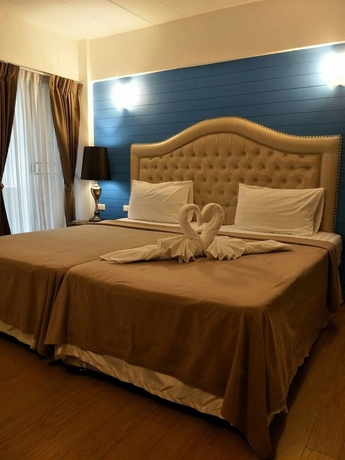 Imagen de la habitación del Hotel I-Inn Hotel. Foto 17