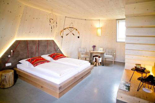 Imagen de la habitación del Hotel IKUNA Naturresort. Foto 6
