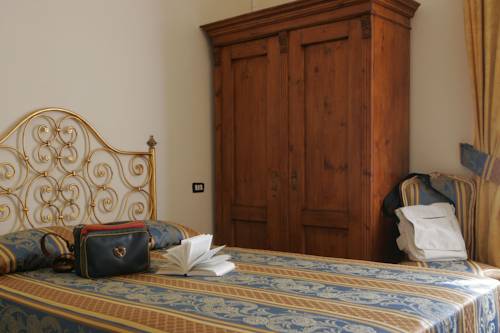 Imagen de la habitación del Hotel IL GRANDUCA. Foto 9