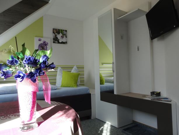 Imagen de la habitación del Hotel ILMHOFpension. Foto 17