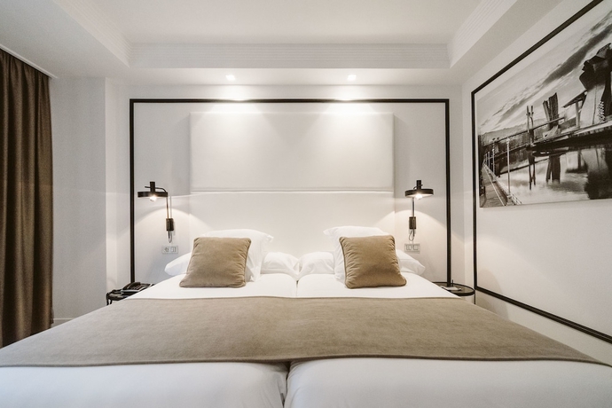 Imagen de la habitación del Hotel ILUNION Abando Bilbao. Foto 11