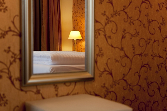 Imagen de la habitación del Hotel IMLAUER Palais Mirabell. Foto 7