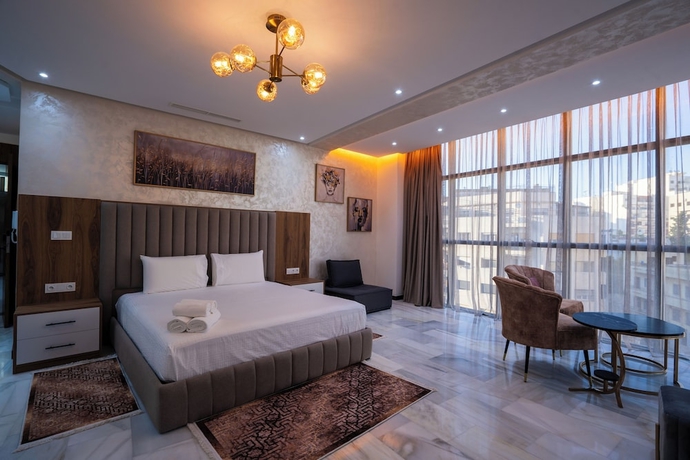 Imagen de la habitación del Hotel IMMOKA SUITES. Foto 1
